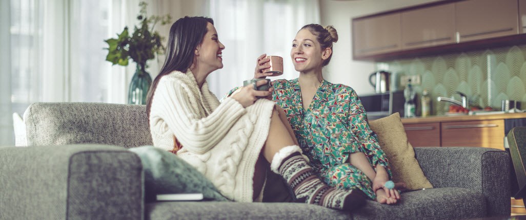 Friends talking and dinking tea