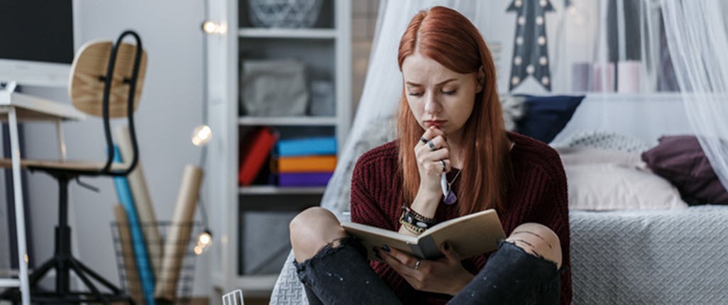 Girl reading diary