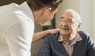 Caregiver with elderly man